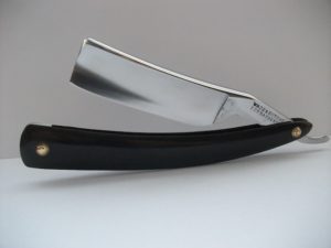 A classic straight razor reflecting a timeless charm